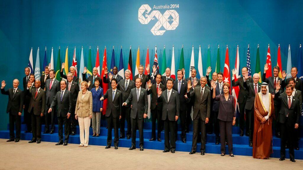 The G20 leaders wave on the final day of the forum, 